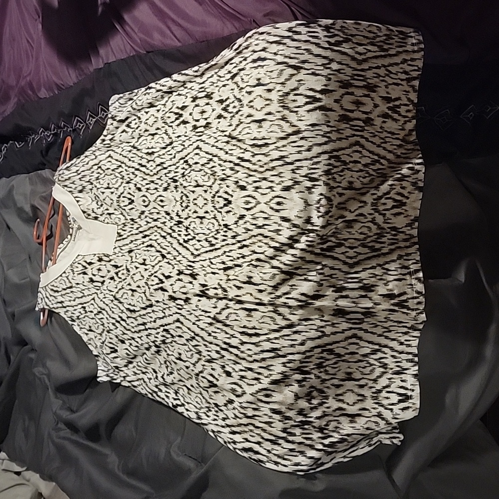 Basic editions animal print dress with a beaded detail on the neckline